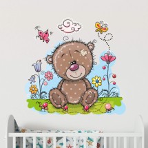 Teddy bear in flowers