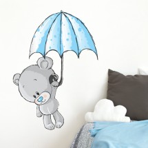 Teddy bear with umbrella