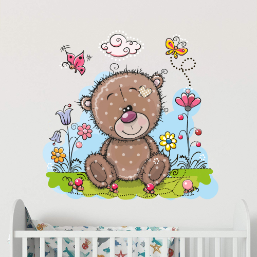Teddy bear in flowers